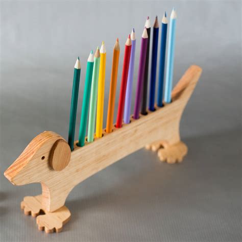 dachshund handcrafted wooden pencil holder by natural gift store | notonthehighstreet.com