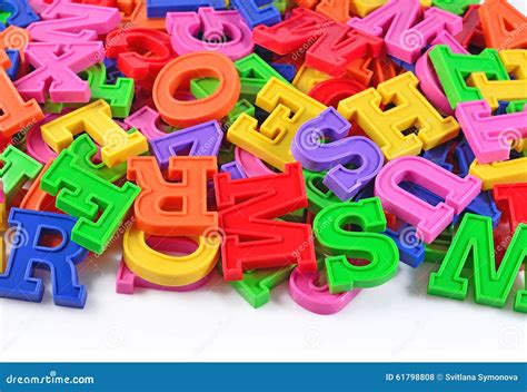 Colorful Plastic Alphabet Letters on a White Stock Photo - Image of ...