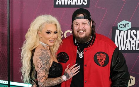 Jelly Roll’s Wife Bunnie Xo Gets Fiery in Flame Boots at CMT Awards 2023 – Footwear News