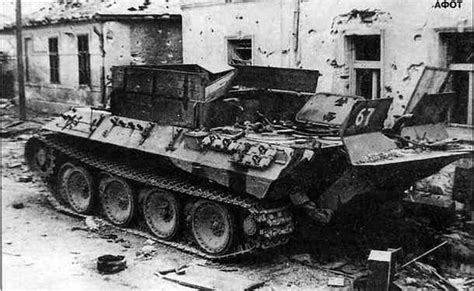 An abandoned Bergepanther. Note the unusual camouflage. | Flickr