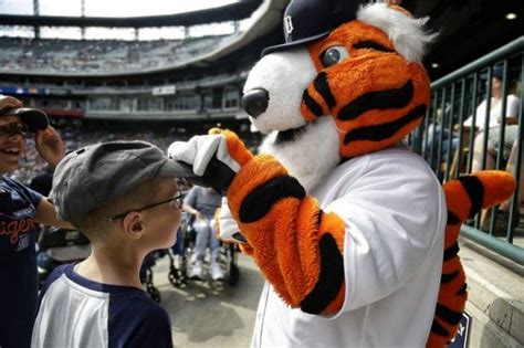 Taking in a Tigers game with PAWS, Detroit's favorite mascot | Tigers game, Mascot, Detroit