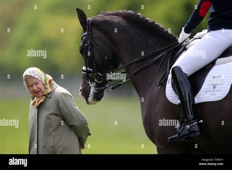 Queen Elizabeth II looks at double world champion dressage horse Valegro during the Royal ...