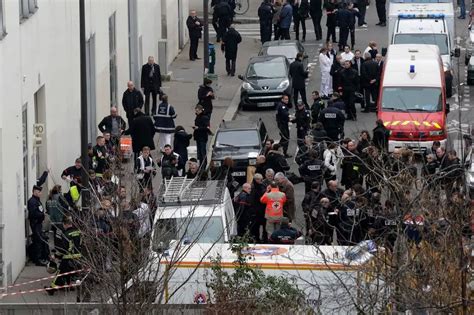 Charlie Hebdo Paris shooting: Three men suspected of killing 12 in terror attack 'holed up near ...