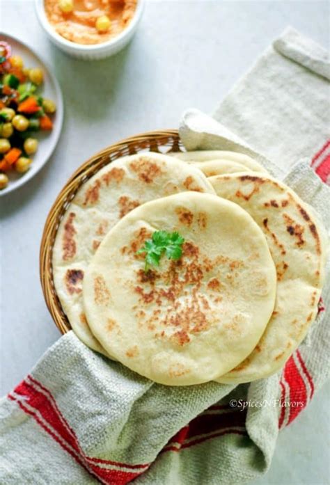 How to make Pita Bread at home like a Pro - Spices N Flavors