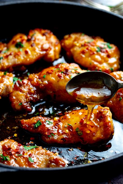 Sticky tender boneless chicken thighs in a garlic, soy and honey sauce ...