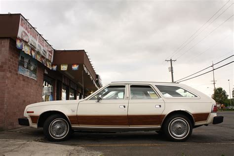 OLD PARKED CARS.: 1982 AMC Concord DL wagon.