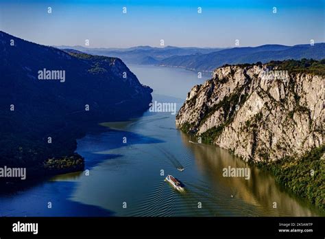 An aerial view of boat in Iron Gates gorge on the river Danube in ...