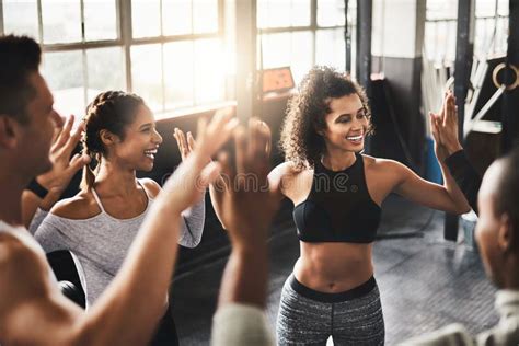 Get Better, Workout Together. a Group of Young People Working Out Together in a Gym. Stock Photo ...