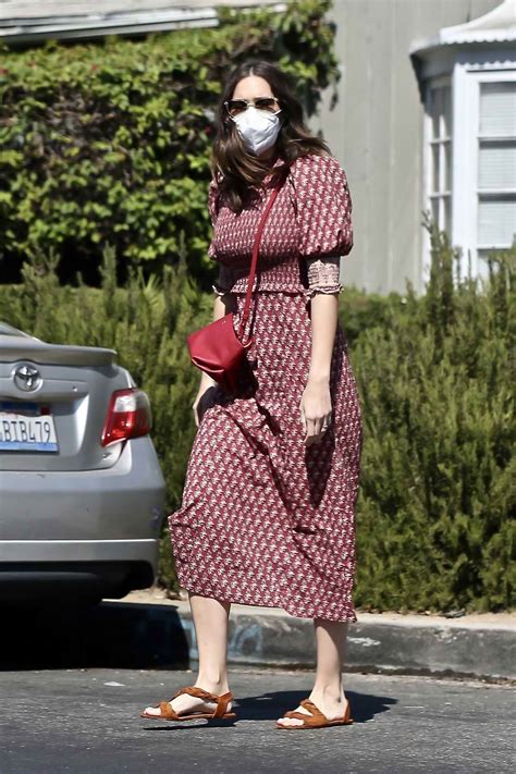 mandy moore shows off her growing baby bump in a printed dress as she visits an acupuncture ...