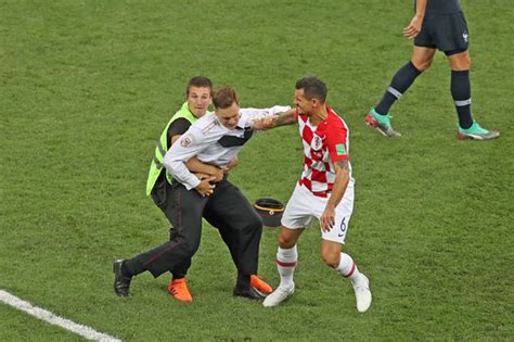 World Cup Final 2018 France v Croatia game HALTED as four pitch invaders cause havoc | TV ...