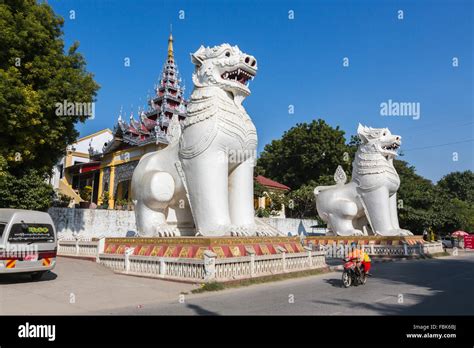 South entrance at the base of Mandalay Hill pagoda, Mandalay, Myanmar (Burma) with giant white ...