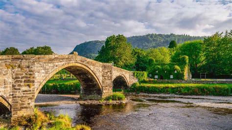 Pont Fawr, a stone arch bridge in Llanrwst, Wales, UK - Bing Gallery