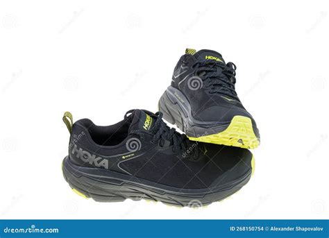 Close-up View of Black Yellow Hoka Sneakers Isolated on White ...