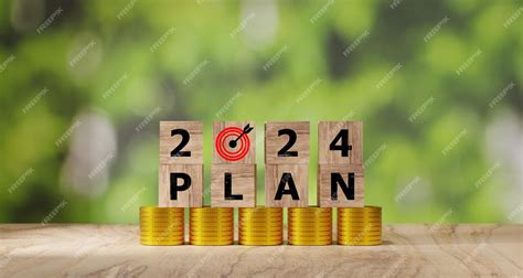 Premium Photo | 2024 action plan cubes with text 2024 plan on coins ...