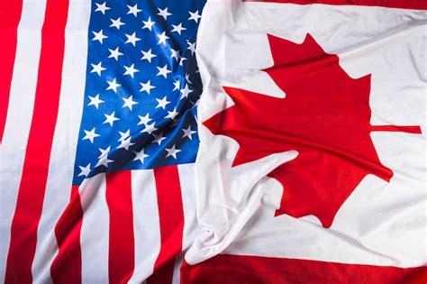 Premium Photo | American and canadian flags together