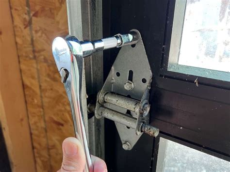 How To Repair a Garage Door Hinge - Learn Garage Doors & More