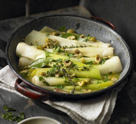LEEKS BRAISED IN WHITE WINE WITH THYME & CORIANDER SEEDS: 6-8 leeks 1 tsp olive oil 2 tsp ...
