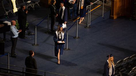 BYU student reveals Pride flag in gown while receiving diploma during ...