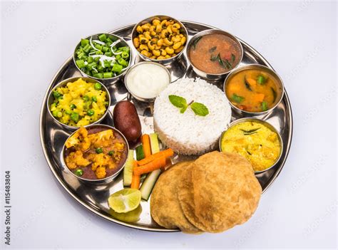 Fotografia do Stock: indian food platter, indian thali, indian veg thali,paratha, rice, aalu ...