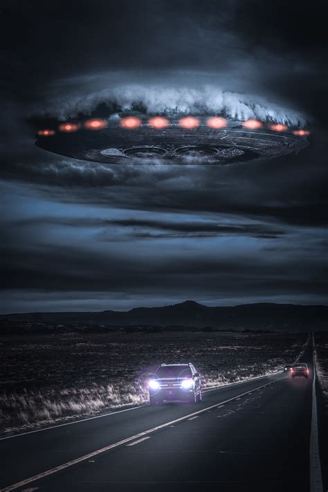 File:Alien spaceship breaking through the clouds over a desert highway.jpg - Wikimedia Commons