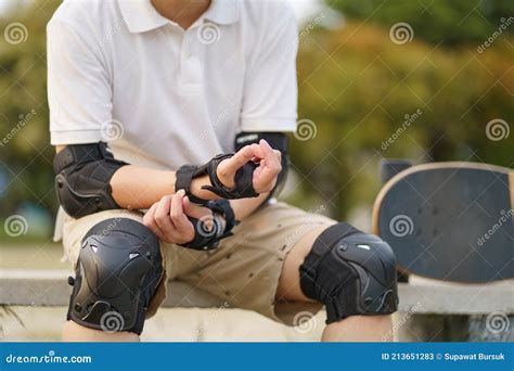 Skateboard Safety Gear and Pads. Asian Man with Surfboards or Surf ...