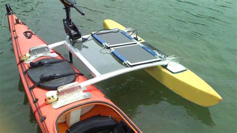 If you're too lazy to paddle your own kayak, the solar-powered SPK-1 outrigger can harness the ...