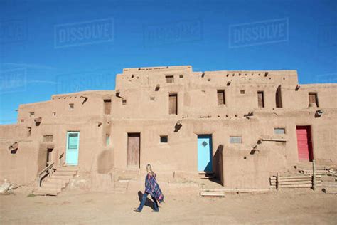 Woman visitor at Taos Pueblo, UNESCO World Heritage Site, Taos, New ...