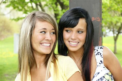 Happy smiling girls stock photo. Image of attractive - 17562424