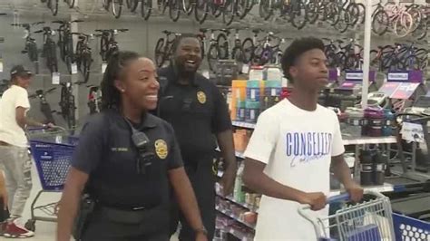 Bessemer youth athletes 'shop with a cop' at Academy