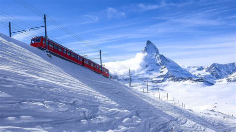 Download Train Swiss Alps Winter Landscape Wallpaper | Wallpapers.com