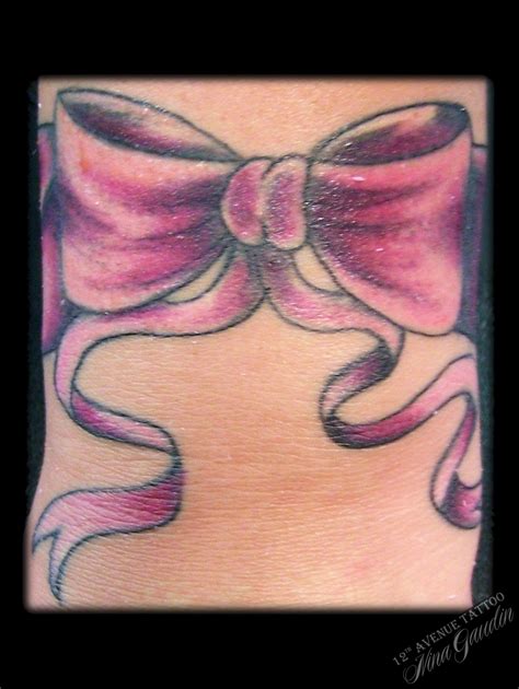 Pink bow colored wrist - Tattoo by Nina Gaudin of 12th Avenue Tattoo in ...