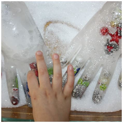 Frozen Hands Ice Melt Science and Christmas activity for Kids