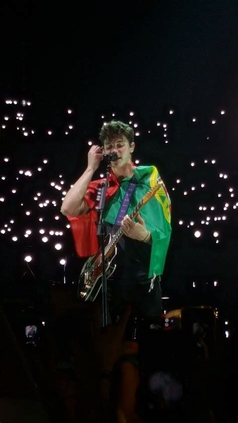 Tour started- at Portugal I love it how he puts the flag around him:) | Shawn mendes, Shanw ...