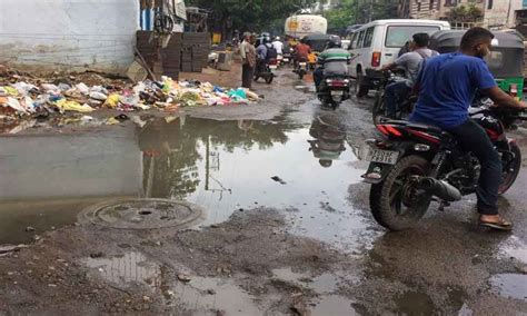 Sewage overflow floods road