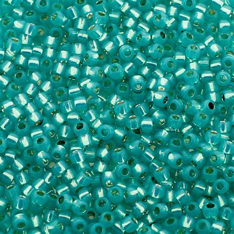 Toho Size 11 Seed Beads 10g - Silver Line Milky Teal | Craft, hobby & jewellery supplies |Totally Be