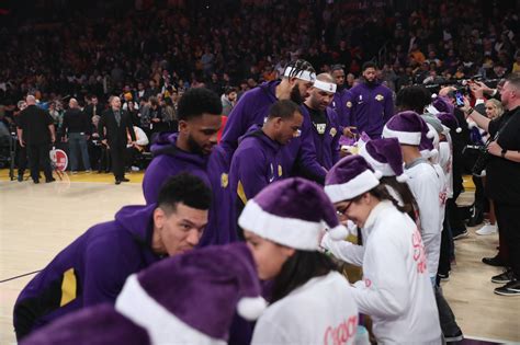 Gallery: 2019's Lakers On-Court Gift Exchange for NBA Cares Season of Giving Photo Gallery | NBA.com