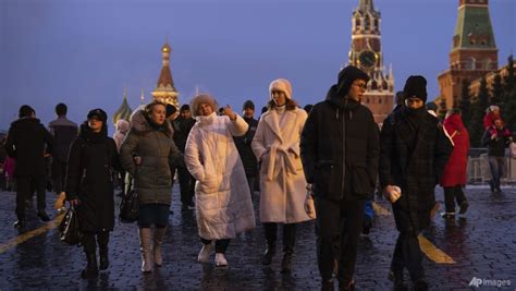 Muscovites mark muted New Year without fireworks, hope for peace - CNA