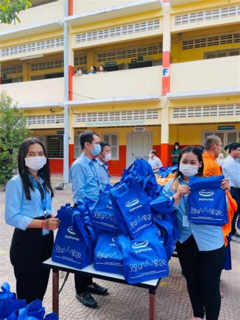 Charity with the Royal University of Phnom Penh - Angkor Milk