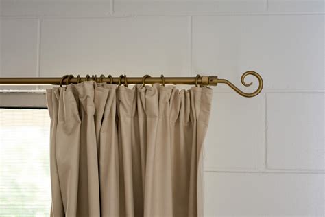 Free Image of Curtain hanging from decorative rod | Freebie.Photography