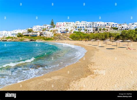 View of beautiful beach in Naoussa town, Paros island, Greece Stock ...