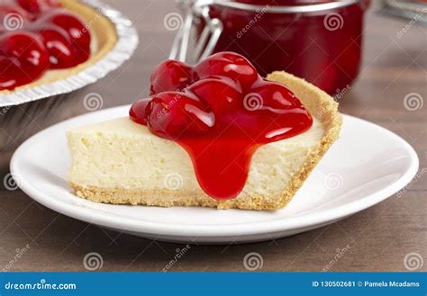 Classic Plain No Bake Cherry Cheesecake in a Graham Cracker Crust Stock ...