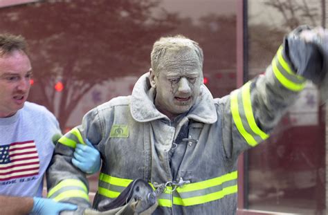 These Powerful Photos Capture The Bravery And Selflessness Of 9/11 First Responders