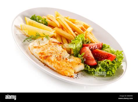 Filet of fish fries Cut Out Stock Images & Pictures - Alamy