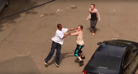 Shocking footage of street fight shows man, woman and dog in violent brawl - World News - Mirror ...