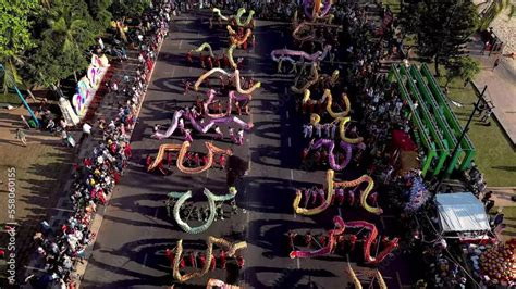 Top view of dragon dance perform celebration new year. Group of people perform a traditional ...