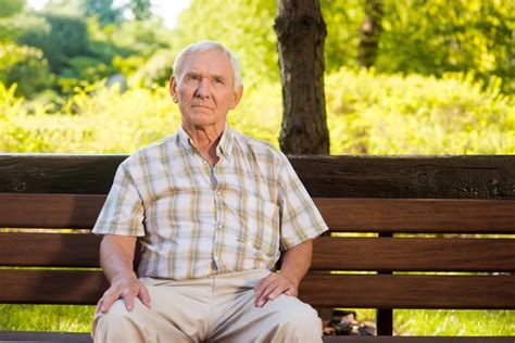 Old man sitting on bench. - Stock Image - Everypixel