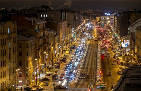 Vehicles Traveling on City Road at Night · Free Stock Photo