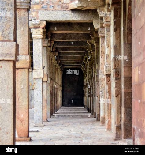 Inside the Qutub Minar Complex with antic ruins and inner square. UNESCO World Heritage in ...