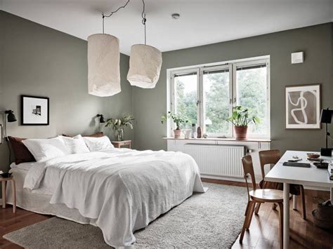 Cozy bedroom with a green wall - COCO LAPINE DESIGNCOCO LAPINE DESIGN