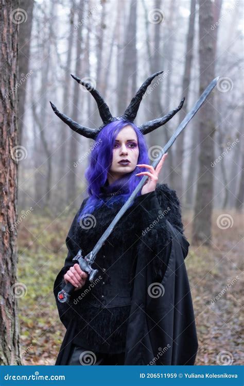 Demon Girl with Halloween Makeup and Purple Hair Holding Sword Stock Image - Image of girls ...